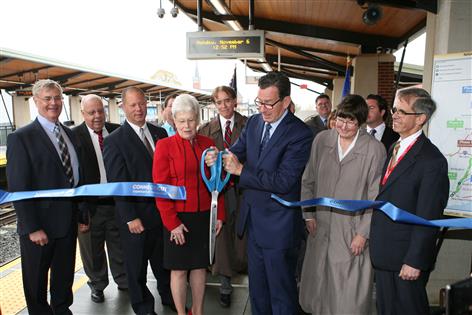 Governor Dannel Malloy cutting the ribbon to officially open the new Wallingford Station.